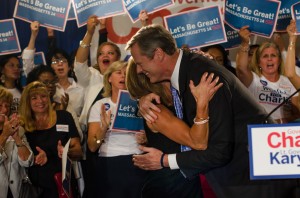 Charlie Baker and Karyn Polito hug after winning the primary at their election party. PHOTO BY MIKE DESOCIO/DAILY FREE PRESS STAFF