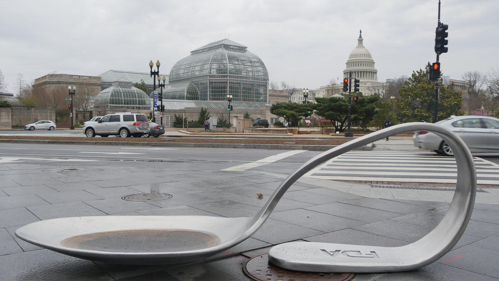 Artist Domenic Esposito’s “FDA Spoon” on the sidewalk in front of the Food and Drug Administration to raise awareness about the opioid epidemic. The sculpture is being installed on Boston University’s campus. COURTESY OF DOMENIC ESPOSITO