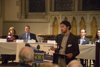 Jonathan Buonocore, a member of the Climate, Energy, and Health team at Harvard's T.H. Chan School of Public Health, speaks about coal deposits and energy Monday at "The Road to 100 Percent” event at the Old South Church in Boston. PHOTO BY NATALIE CARROLL/ DAILY FREE PRESS STAFF 