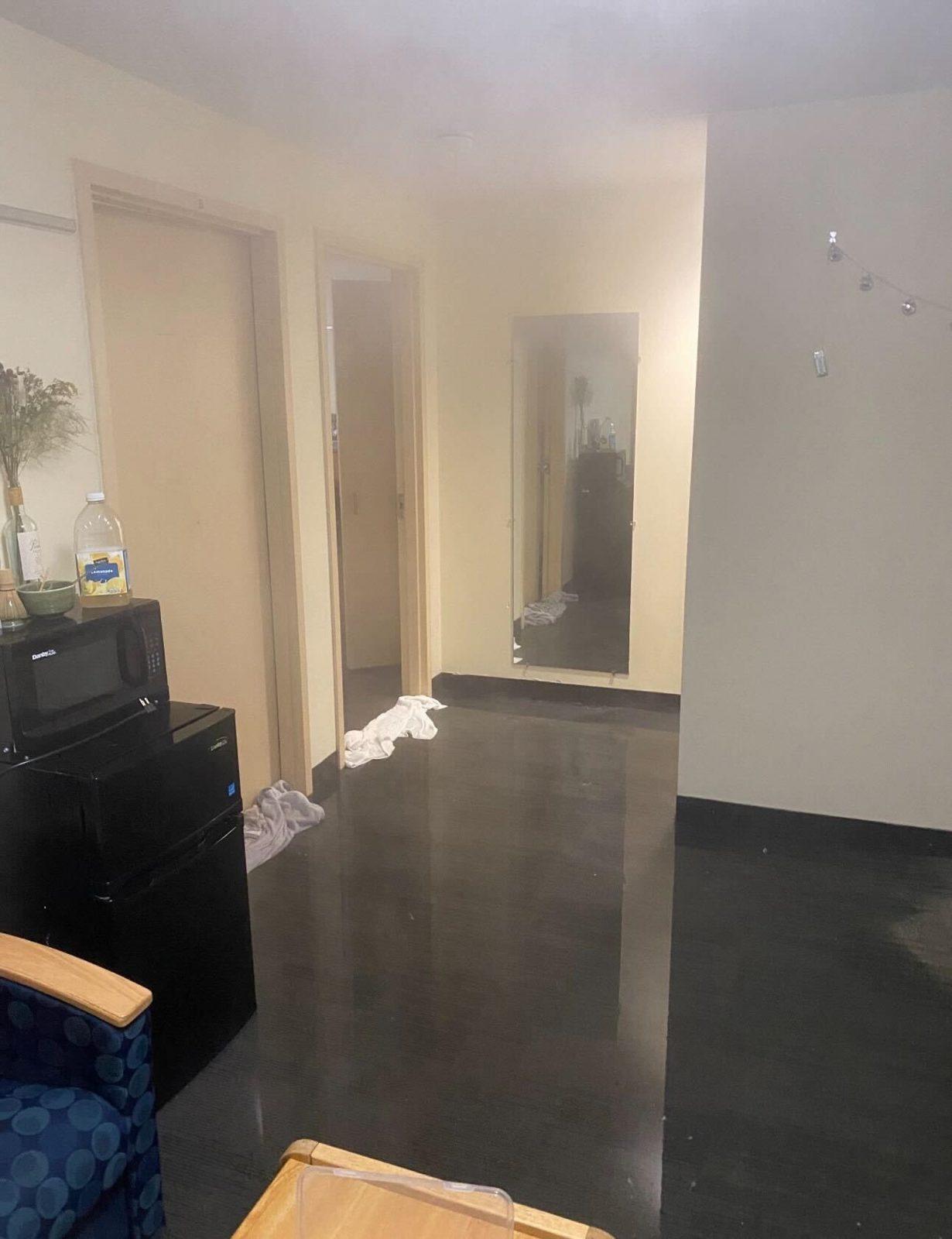 A flooded residence in Boston University’s 1019 Commonwealth Avenue dormitory. A pipe burst in the dorm on Tuesday night, and affected students have been relocated to West and South Campus during repairs. COURTESY OF JOSH LEE