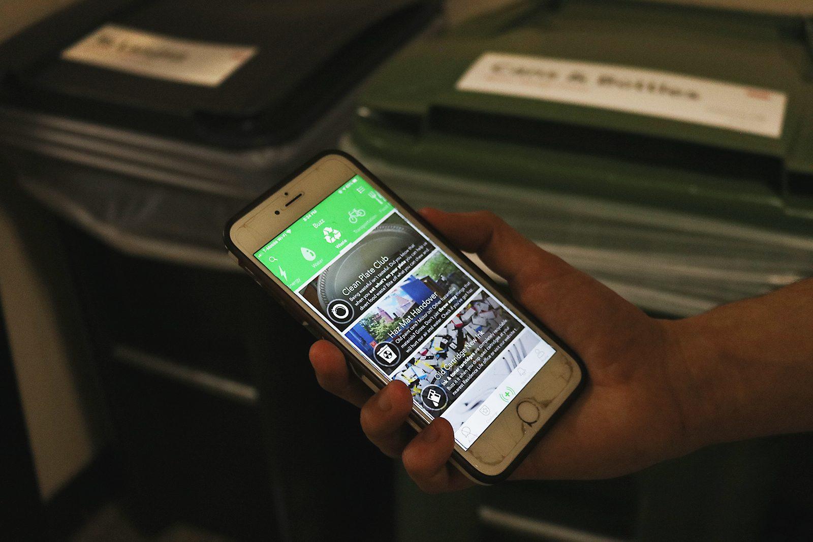 The sustainability@BU phone app, created to encourage environmentally conscious practices across campus through fun competitions and games. CHIKA OKOYE/ DAILY FREE PRESS STAFF