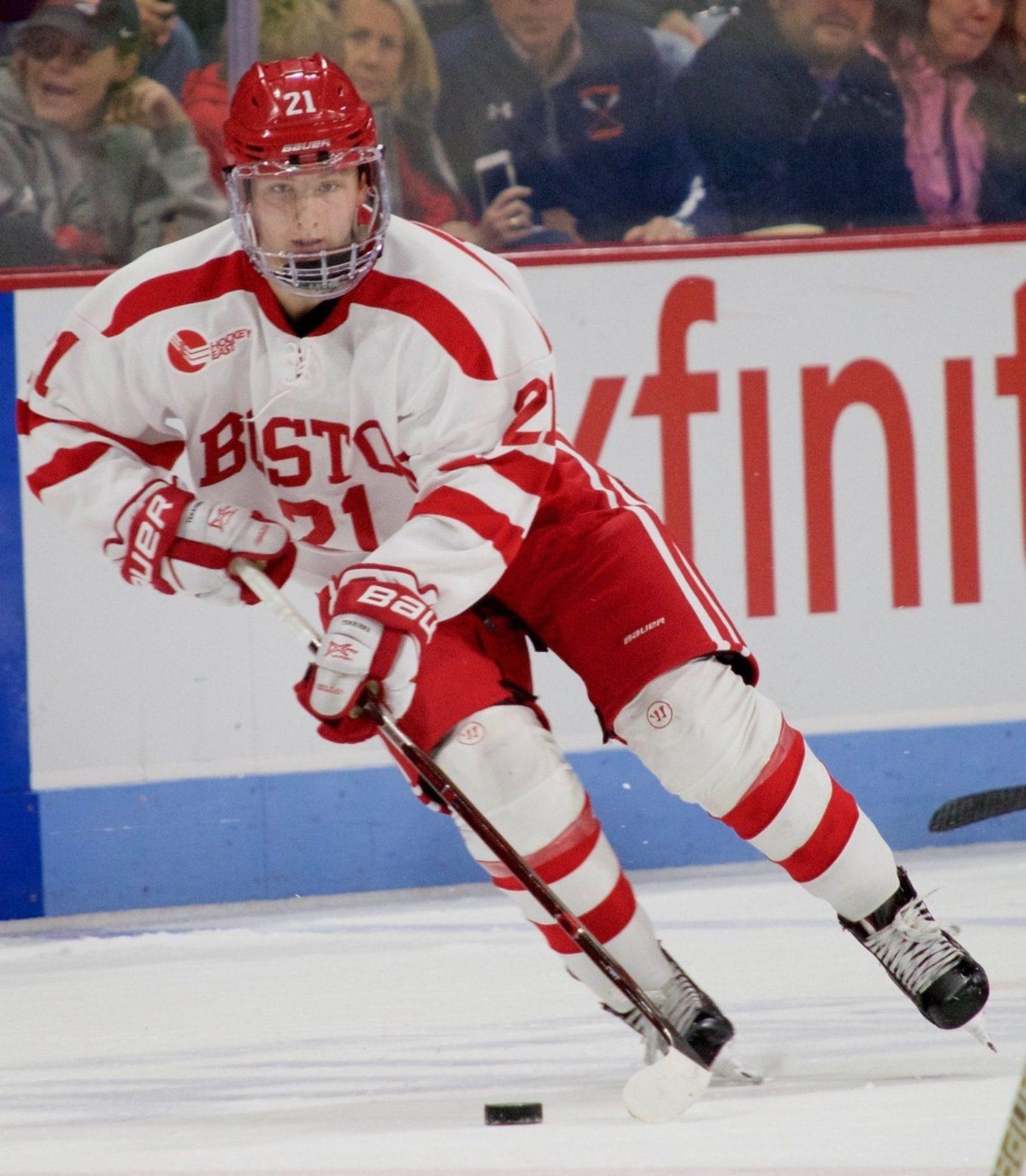Patrick Harper handles the puck in the Terriers' 6-3 loss. PHOTO BY CHLOE GRINBERG/ DAILY FREE PRESS STAFF