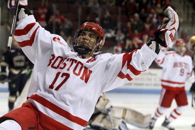 Senior assistant captain Evan Rodrigues celebrates after his goal in the third period. PHOTO BY MAYA DEVEREAUX/DAILY FREE PRESS STAFF