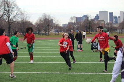 Sophomore Erin Jansen receives a pass from a teammate on the Quidditch team.  PHOTO COURTESY OF ERIN JANSEN