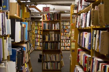 If customers cannot find a title, Harvard Book Store can publish a book within 5 minutes and deliver it the same day with bicycle shipping.  Photo illustration by Michelle Jay / Daily Free Press Staff