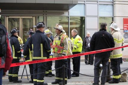 Fire officials respond to the chemical spill at 24 Cummington Street Tuesday. PHOTO BY SARAH FISHER/DAILY FREE PRESS.