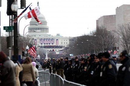 Police Officers line Constitution Avenue leading toward the West Front of the Capitol building in Washington, D.C. on the day of the 57th Presidential Inauguration. PHOTO BY BILLIE WEISS/BU NEWS SERVICE