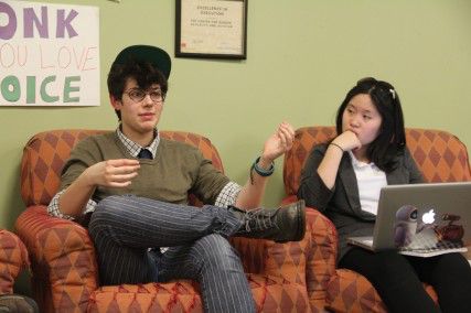 College of Fine Arts freshman Lennie Naughton and School of Management sophomore Fiona Chen deliberate how to inform the student body about General Neutral Housing at the GNH meeting Monday night at the Center For Gender, Sexuality and Activism. PHOTO BY SARAH SIEGEL/DAILY FREE PRESS STAFF