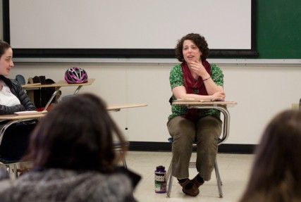 Liza Behrendt, member of Jewish Voice for Peace, leads a discourse about Birthright Israel with BU students at the College of Arts and Sciences Wednesday evening. PHOTO BY KENSHIN OKUBO/DAILY FREE PRESS STAFF 