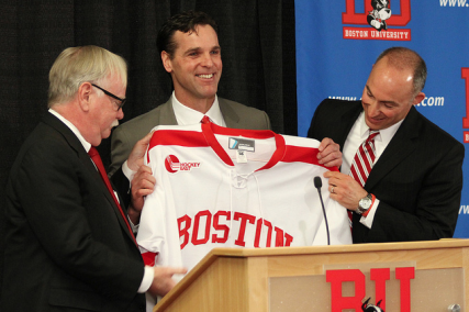 David Quinn is presented as Boston University's new men's hockey coach by BU's president, Robert Brown, and Director of Athletics, Mike Lynch, at a press conference Tuesday at BU's School of Management. PHOTO BY Michelle Jay