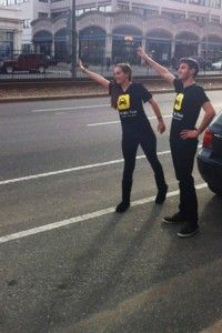 Photo Courtesy of David Danesh  App co-creator and SMG sophomore David Danesh and CGS sophomore Hannah Paull wave down a taxi on Commonwealth Ave.