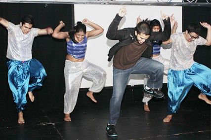 College of Arts and Sciences junior Tubby Pandita performs with fellow Jalwa dancers CAS freshman Nalini Balakrishnan, College of Engineering senior Jake Kallarackal and CAS sophomore Arsh Kakar at a launch party for the new Student Activities Office website Monday night in BU Central. PHOTO BY KIERA BLESSING/DAILY FREE PRESS STAFF