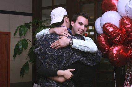 Members of the Boston University Student Government slate "Becoming United" embrace after learning the results of the election. MAYA DEVEREAUX/DAILY FREE PRESS STAFF