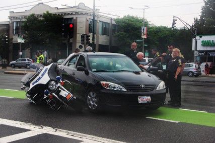 Two BUPD officers were hit by a car doing a U-turn Sunday at 2 p.m. near West Campus. PHOTO BY SARAH SIEGEL/DAILY FREE PRESS STAFF