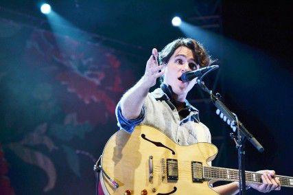 Frontman Ezra Koenig of Vampire Weekend performing at Boston Calling's Saturday lineup 