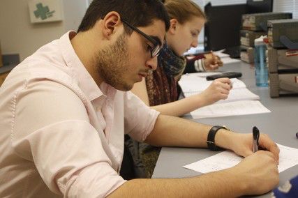 Freshman engineering students take a quiz in an introduction to engineering class. According to a study released by ACT, more students are choosing majors such as engineering due to high future job prospects.PHOTO BY SARAH FISHER/DAILY FREE PRESS STAFF