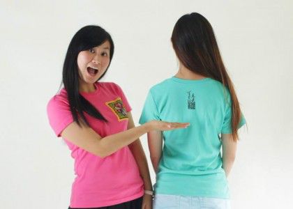 BU student Chenxi Ouyang (left) and designer Claire Sun (right) pose in the Bright and Beautiful Girl Project’s shirts. PHOTOS COURTESY OF CHENXI OUYANG 
