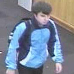 A surveillance camera captured the face of a college-age suspect accused of four library thefts. PHOTO COURTESY OF BU POLICE DEPARTMENT