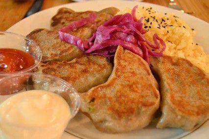 Mei Mei Kitchen pairs its braised beef dumplings with sriracha sticky rice, pickled red cabbage, garlic aioli and spicy ketchup. BROOKE JACKSON-GLIDDEN/DAILY FREE PRESS STAFF