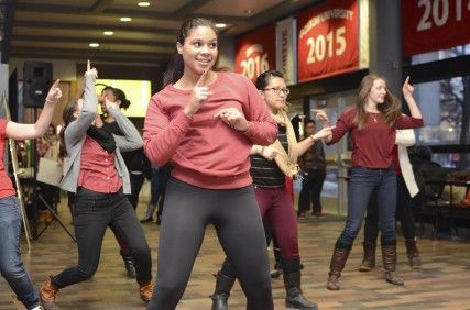 The Sexual Assault Response and Prevention Center held a flash mob at the George Sherman Union Friday as a part of an international day of support for women affected by violence. PHOTO BY MIKE DESOCIO/DAILY FREE PRESS