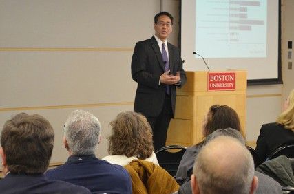 Willis Wang, chair of the Ad Hoc Committee, discussed the effectiveness in meeting the needs of international students at a Boston University Town Hall meeting Friday evening at the Photonics Center. PHOTO BY ERIN TOUHEY/DAILY FREE PRESS STAFF