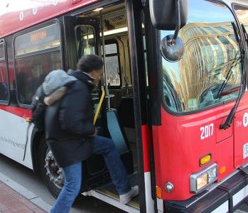 In an effort to prevent university non-affiliates from riding the Boston University Shuttle, Parking and Transportation Services requires students to periodically display their BU IDs before boarding the bus as of Tuesday. PHOTO BY ALEXANDRA WIMLEY/DAILY FREE PRESS STAFF 