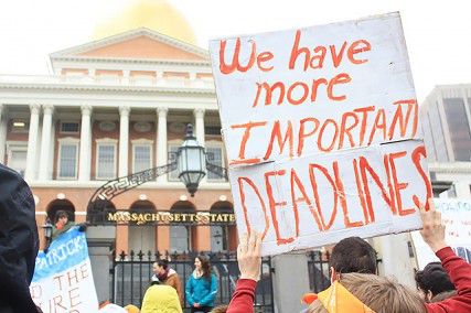 Student protesters gathered outside the Massachusetts State House Monday morning for a climate change walkout where they urged Gov. Deval Patrick to stop investing money in fossil fuels. PHOTO BY OLIVIA NADEL/DAILY FREE PRESS STAFF