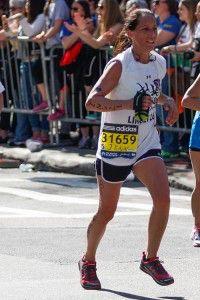 SARAH FISHER/DAILY FREE PRESS STAFF Jennifer Carter-Battaglino, 2003 graduate of the School of Education also ran to honor of Lu Lingzi.