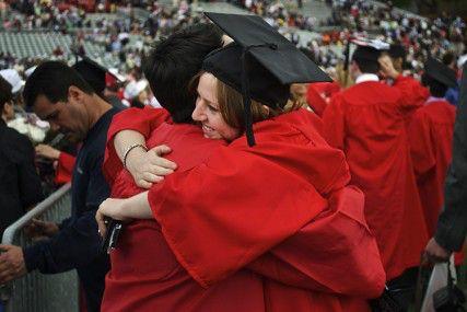 Students of the Class of 2014 at Boston University applaud during their commencement ceremony on May 18 on Nickerson Field. PHOTO BY RODRIGO BONILLA/DAILY FREE PRESS STAFF