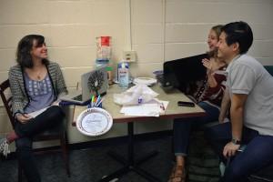 Grace Pearson (COM ’17), Hannah Cawley (CAS ’17) and Ja-Hon Wang (CAS ’17) spend time in the Warren 7B common room.  PHOTO BY EMILY ZABOSKI/DAILY FREE PRESS STAFF