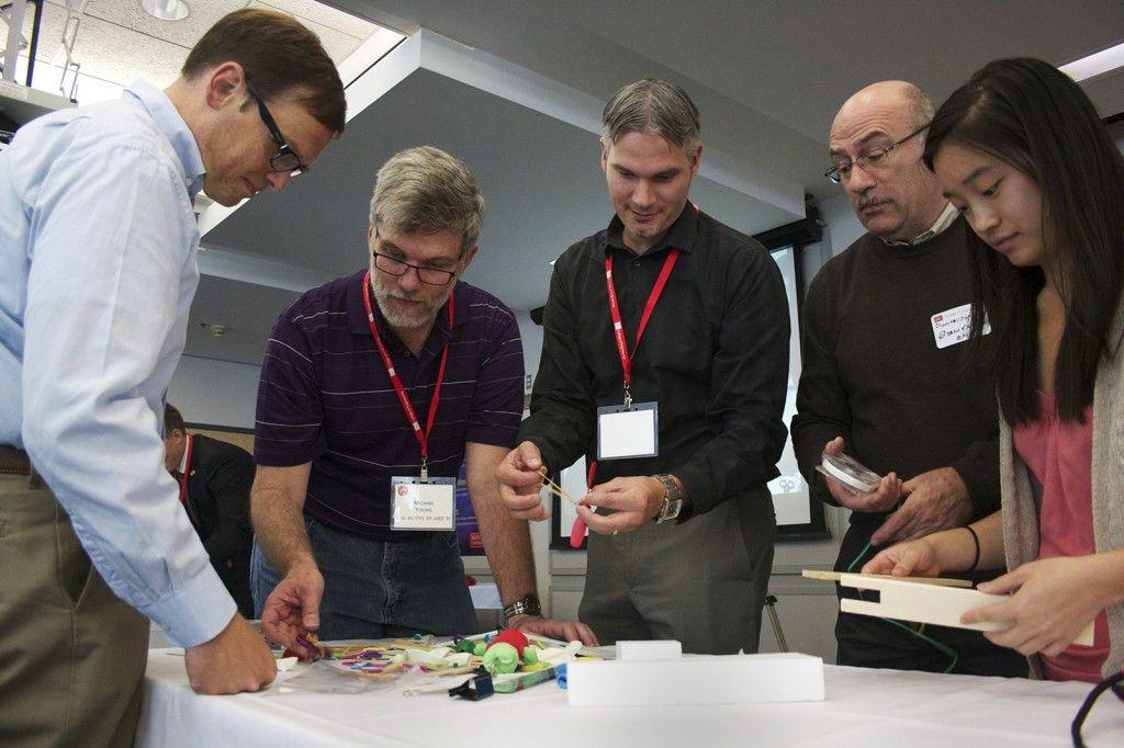 Boston University students and alumni work together during the team design challenge, part of BU’s College of Engineering 50th anniversary celebration. PHOTO BY KYRA LOUIE/DAILY FREE PRESS STAFF