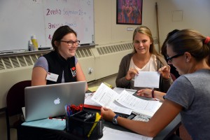 Student Activities Consultant Madison Dinndorf (SMG '16) works with Charlotte Miller (SMG '16) and Gwen Jahnke (SED '16) to plan their event. PHOTO BY HEATHER GOLDIN/DAILY FREE PRESS STAFF
