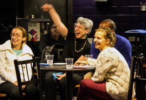 Mary Elizabeth Moore (center), dean of the Boston University School of Theology, cheers with BU students at BU Central for Sons of Serendip, a musical act composed of BU alumni, during the America’s Got Talent season finale. PHOTO BY ALEXANDRA WIMLEY/DAILY FREE PRESS STAFF 