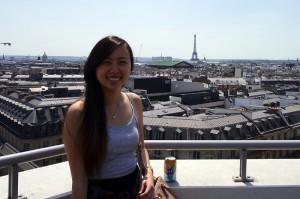 College of General Studies sophomore Jane Lu poses with the Parisian skyline. PHOTO COURTESY OF JANE LU