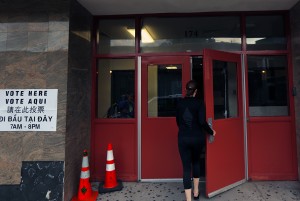 A resident walks into the Boston Arts Academy voting facility for the gubernatorial primary election. PHOTO BY JUSTIN HAWK/DAILY FREE PRESS STAFF
