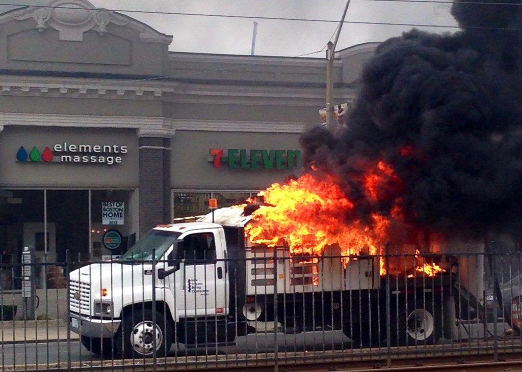 A vehicle was caught on fire on Commonwealth Avenue in Boston University's western portion of campus Friday morning. PHOTO BY TARYN OTTAUNICK/DAILY FREE PRESS STAFF