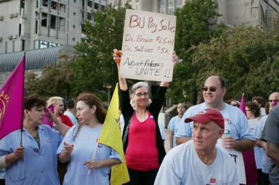 Dr. Maureen Sullivan, an adjunct professor at Boston University, protests for better wages and job contracts with BU workers Oct. 15. PHOTO BY FELICIA GANS/DAILY FREE PRESS STAFF