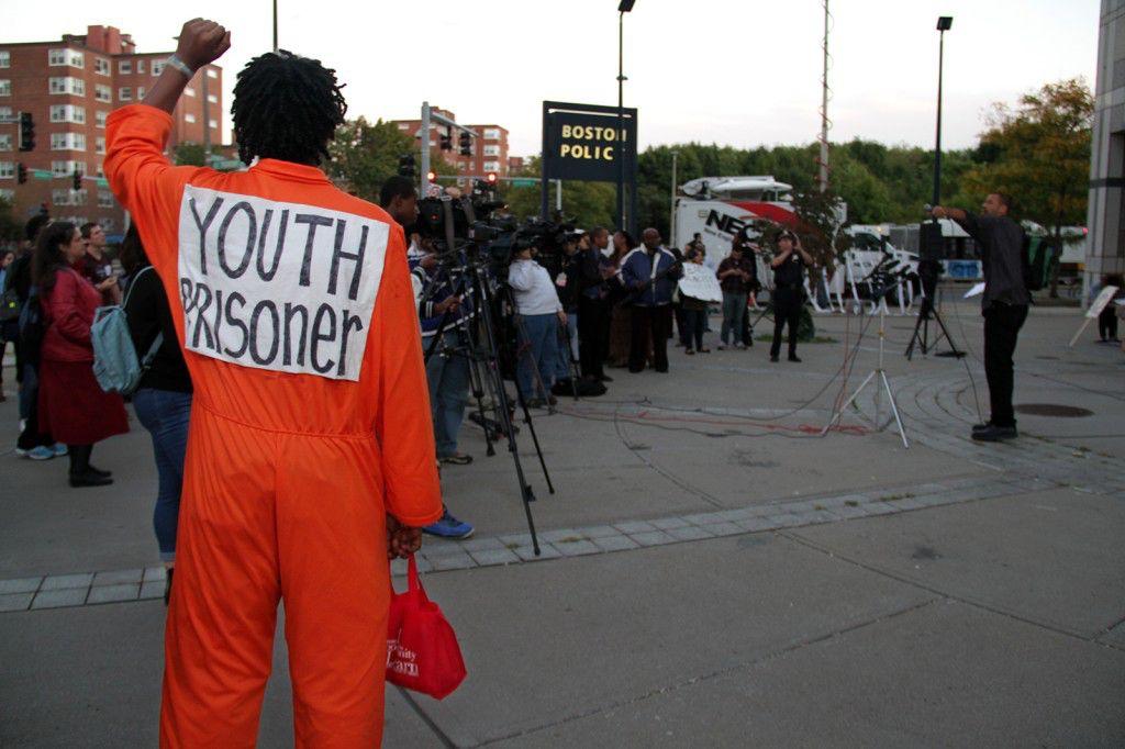 Luis Navarro, a 16-year-old Worchester resident, protested outside the Boston Police Department Thursday with other supporters of the Boston Coalition for Police Accountability to highlight the injustices of racial profiling. PHOTO BY SARAH SILBIGER/DAILY FREE PRESS STAFF