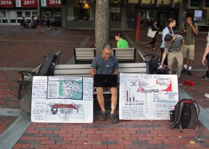 Jake Yu (CAS '17) protests the lack of mapping for the Ebola virus by not attending classes and raising awareness for better mapping of the virus. PHOTO BY SARAH SILBIGER/DAILY FREE PRESS STAFF