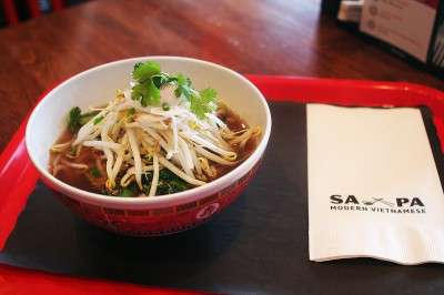 Sa Pa's pho is a Vietnamese noodle soup consisting of scallions, bean sprouts, cilantro, carrots, Thai basil and braised beef or marinated tofu. PHOTO COURTESY OF JACLYN VAZQUEZ