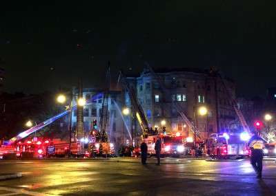 A four-alarm fire on Beacon Street temporarily displaced 40 residents from their homes early Sunday morning. PHOTO BY KYRA LOUIE/DAILY FREE PRESS STAFF