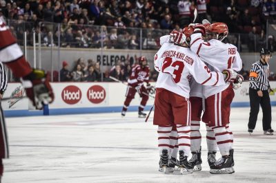 Terriers celebrate after a goal against Harvard. PHOTO BY MADDIE MALHOTRA/ DAILY FREE PRESS STAFF 