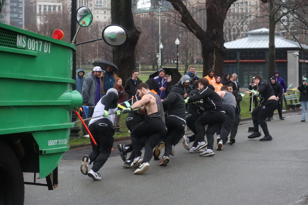 Competitors pull a duck boat in Boston Common. The Curry College team won the first annual Duck Boat Pull competition which was hosted by the Boston Parks and Recreation Department to raise money for Boston youth sports programming.