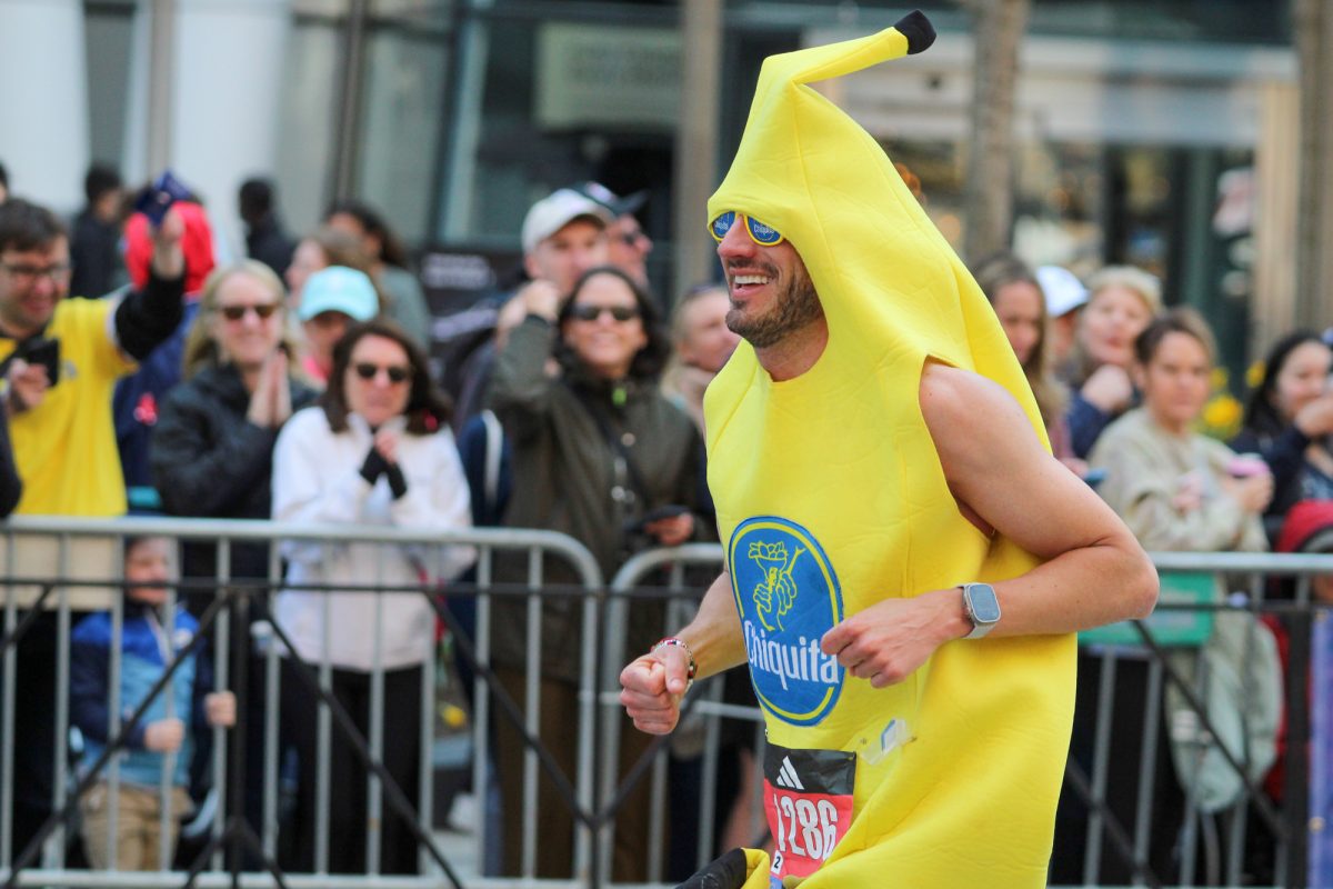 Jordan Maddocks runs the Boston Marathon in a banana suit. 