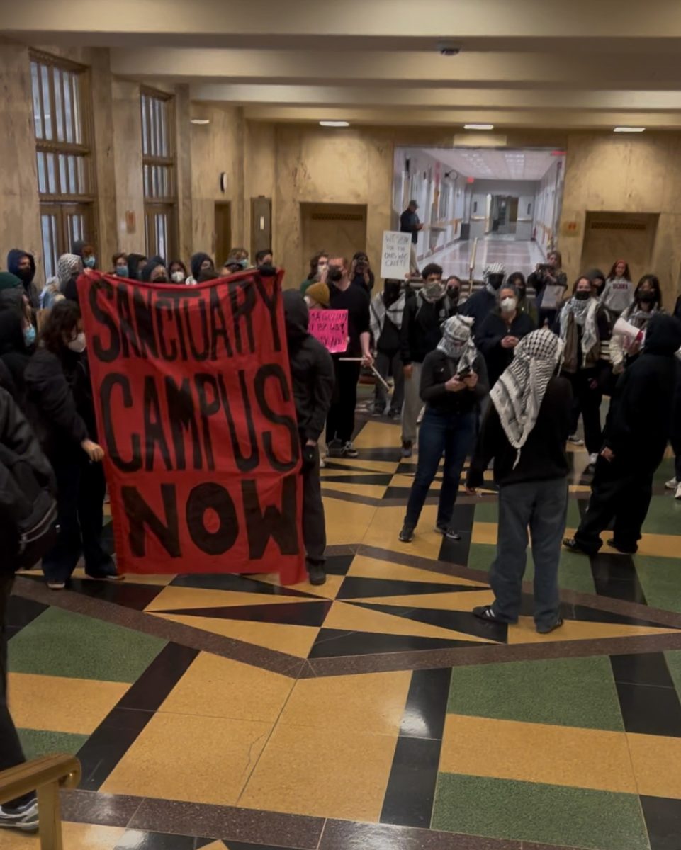 Boston University students participate in a protest against the suspension of BU Young Democratic Socialists of America chapter Wednesday. YDSA was suspended April 11 for violating university policy.