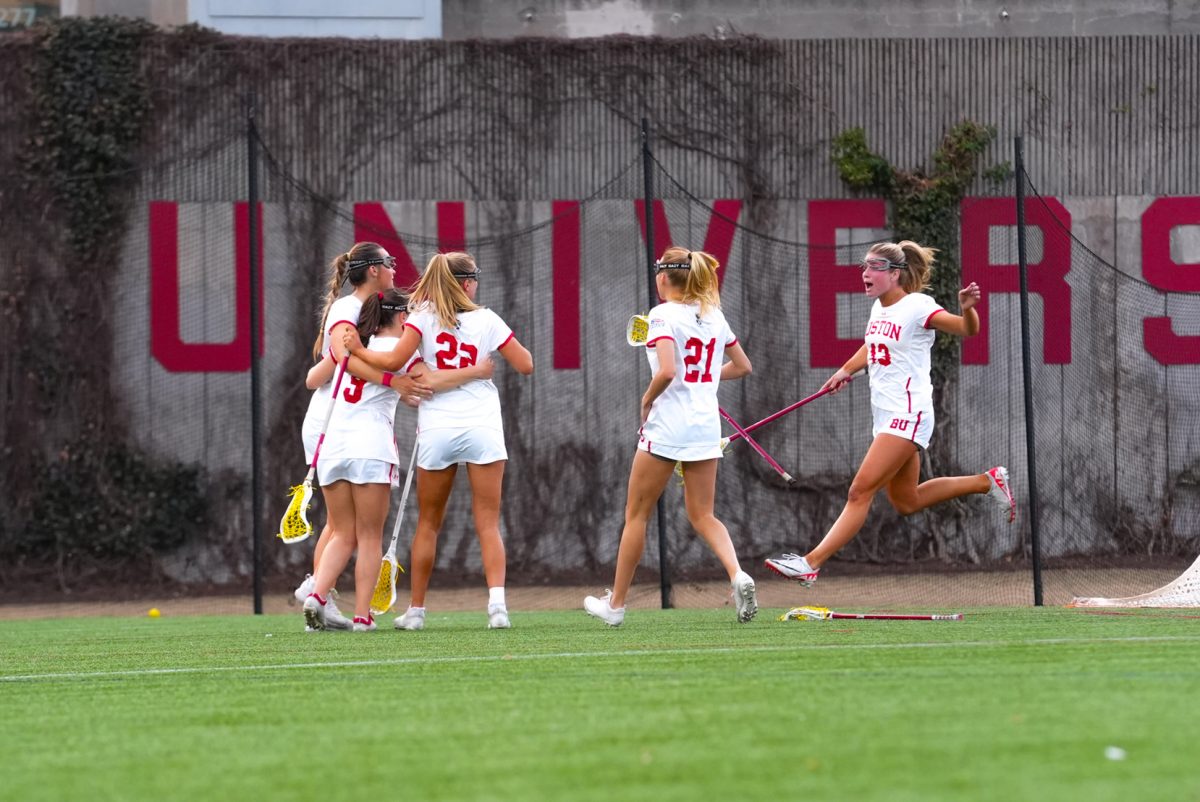 The Boston University women’s lacrosse team celebrates a goal during the game against Bucknell University March 15. The Terriers fell to Loyola Maryland 20-14 on Senior Day Saturday. COURTESY OF ERIN BUSH/BU ATHLETICS