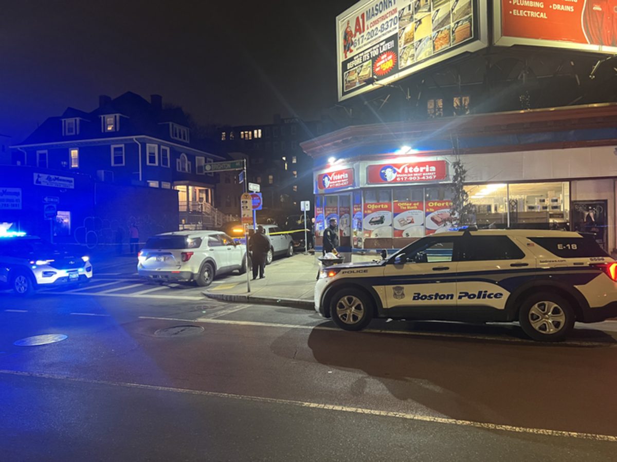 Boston Police cars and cordoned-off area around Glenville Avenue Street in Allston. Boston Police officers are investigating a homicide in the Allston neighborhood and currently have one suspect in custody, said Officer Mark Marron of the BPD.