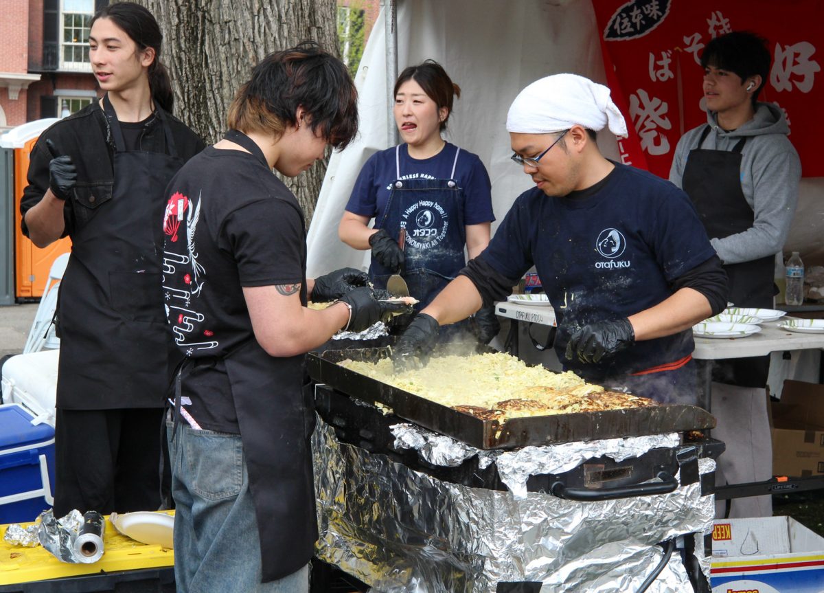 Otafuku Foods prepares Okonomiyaki for attendees during the festival. 