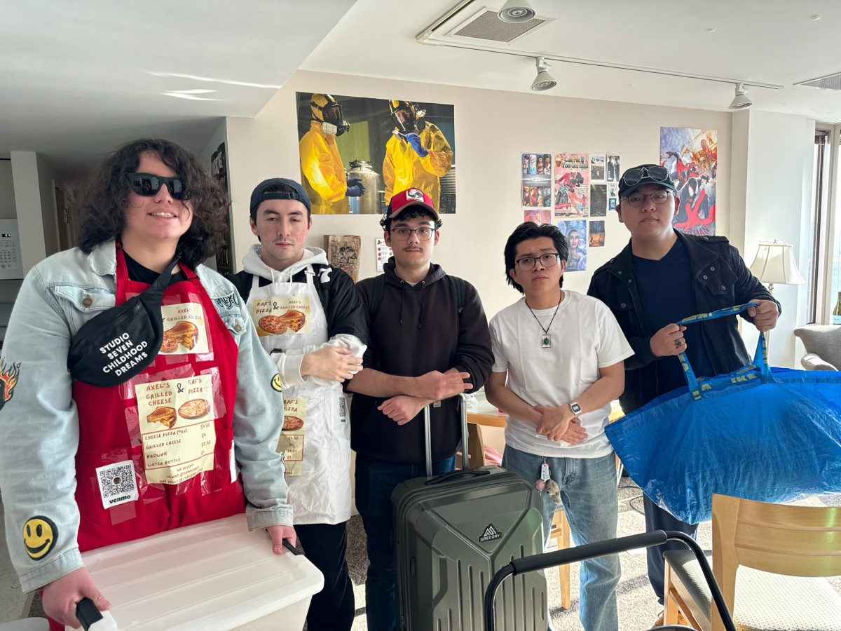 From left to right, Wilmer Castro, Liam Henson, Rafaele DiMaggio, Axel Bautista-Tienda, Ken Miao. DiMaggio and Bautista-Tienda created “Marmon Cheesers” a few weeks before Marmon 2024 to sell grilled cheeses, helping partygoers who face difficulties getting food and water during the event. COURTESY OF MARMON CHEESERS 