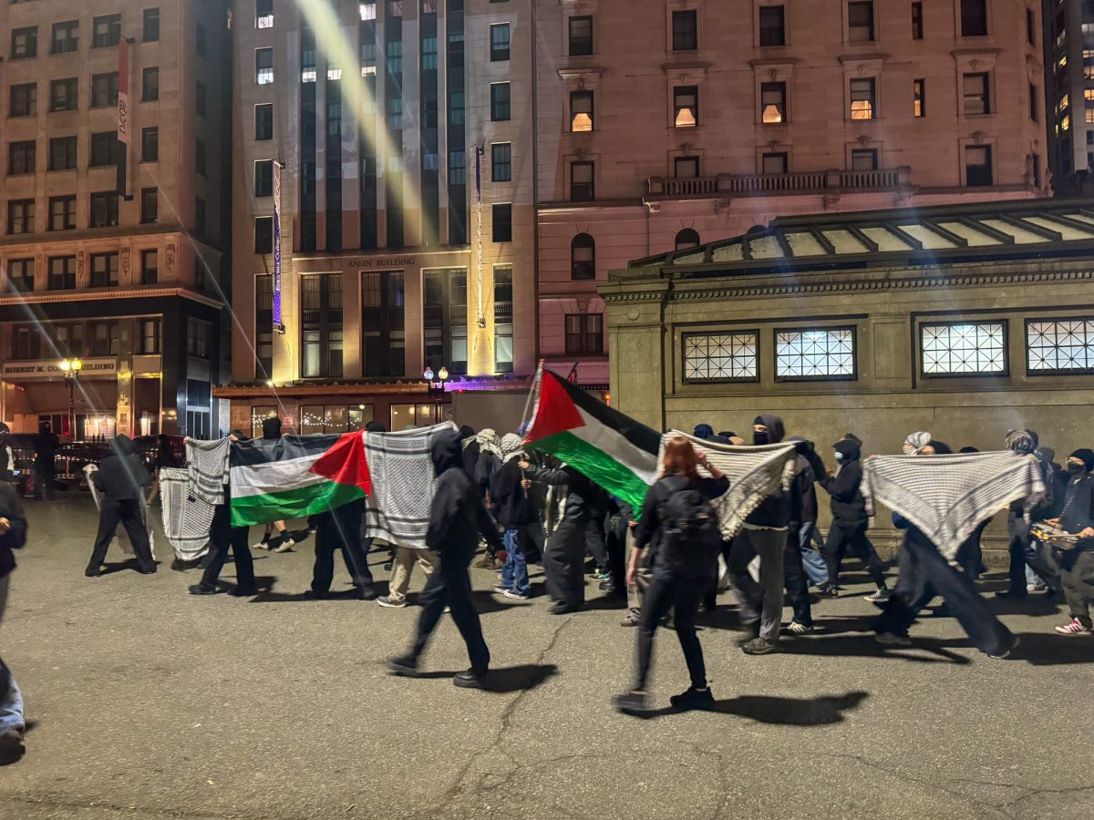 Protestors at a rally organized by Boylston Students for Justice in Palestine Friday. Boylston SJP members protested an article published by Emerson College’s student newspaper. The article contained bodycam footage of the police raid on Boylston SJP’s pro-Palestine encampment last year. 